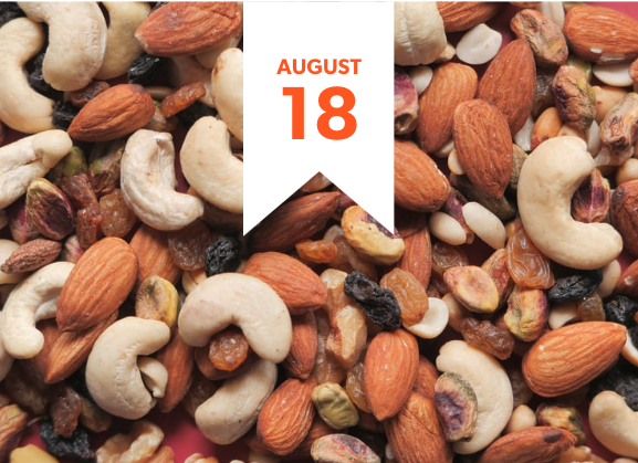 Day 1: Your Revenue Reality Check — August 18th A colorful trail mix (nut mix) with a ribbon marked "August 18th," symbolizing the balance and diversity of Day 1 in the nonprofit revenue workshop.
